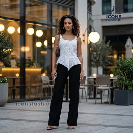 Women-white-sleeveless-peplum-top-with-corset-style-paneling-and-back-tie-up-closure