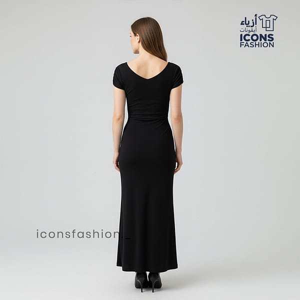 Black-bodycon-party-wear-dress-for-women-with-V-neckline-short-puff-sleeves-sheer-mesh-waist-panel-and-asymmetric-ruffle-hem