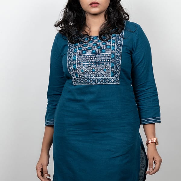 Teal-blue-cotton-blend-straight-kurta-for-women-with-embroidered-yoke-round-neck-3/4-sleeves-and-side-slits-styled-with-light-blue-bottoms
