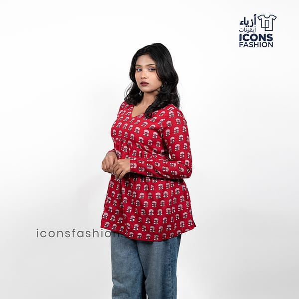 Woman-red-printed-kurta-with-v-neck-long-sleeves-and-flared-a-line-silhouette