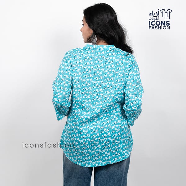 Blue-printed-tunic-top-with-three-quarter-sleeves-and-notched-neckline