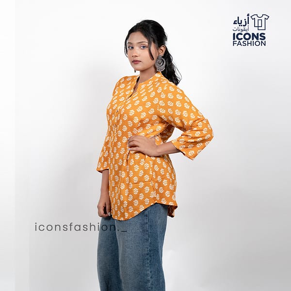 Mustard-yellow-printed-tunic-top-with-three-quarter-sleeves-and-notched-neckline