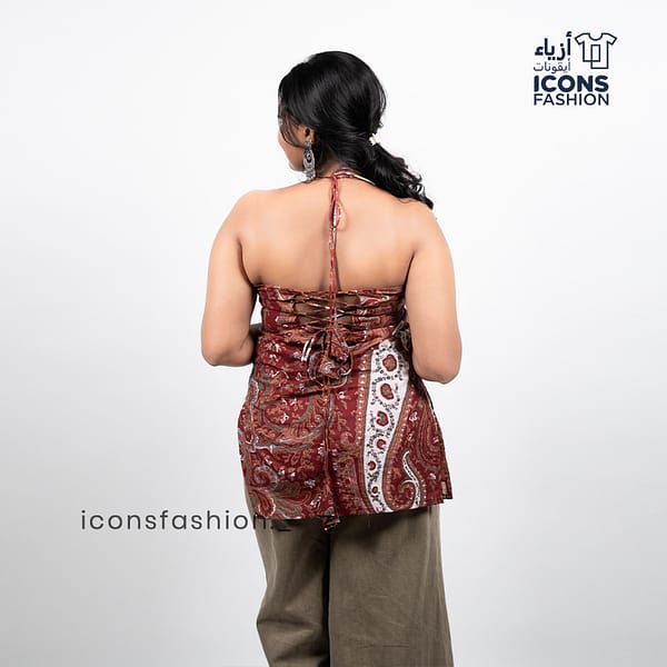 Woman-maroon-paisley-printed-sleeveless-halter-neck-kurta-with-open-back-and-tie-up-detail
