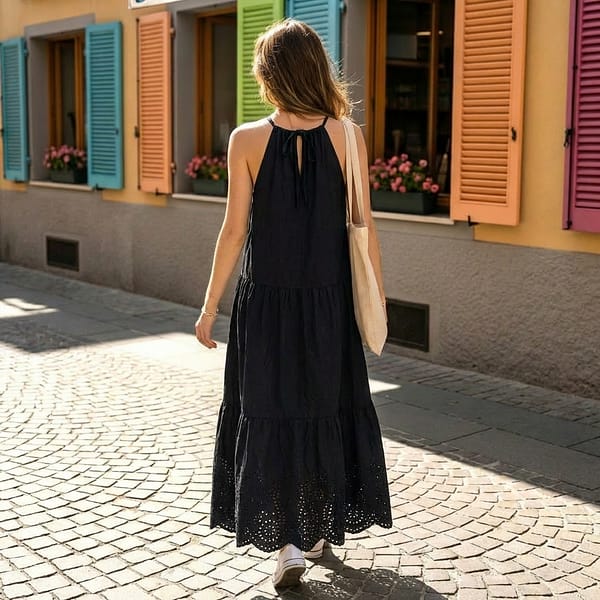 Women-black-sleeveless-halter-neck-tiered-midi-dress-with-eyelet-hem