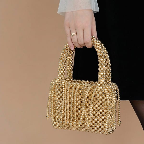 Women’s-gold-pearl-beaded-mini-handbag-with-top-handle