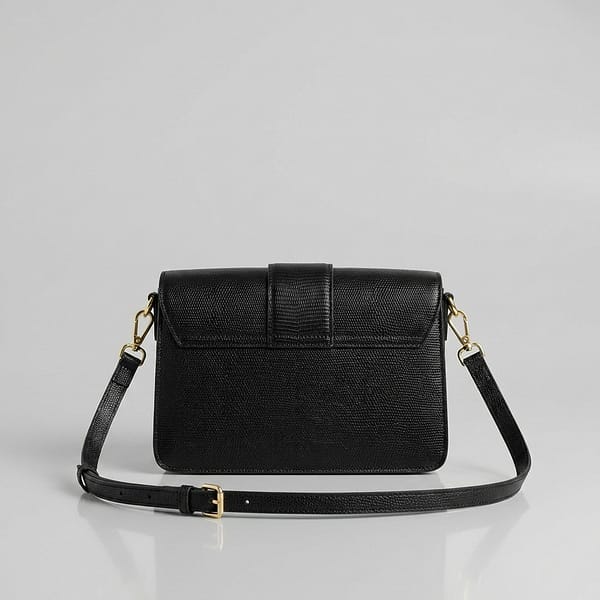 Black-structured-flap-shoulder-bag-with-gold-hardware-and-adjustable-crossbody-strap