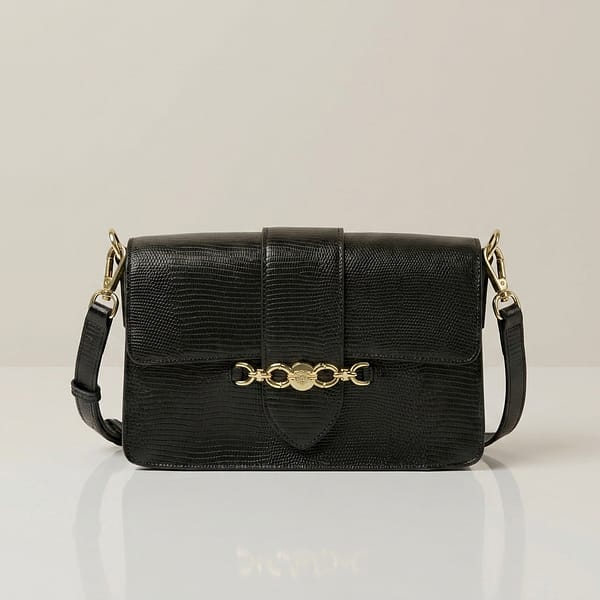 Black-structured-flap-shoulder-bag-with-gold-hardware-and-adjustable-crossbody-strap